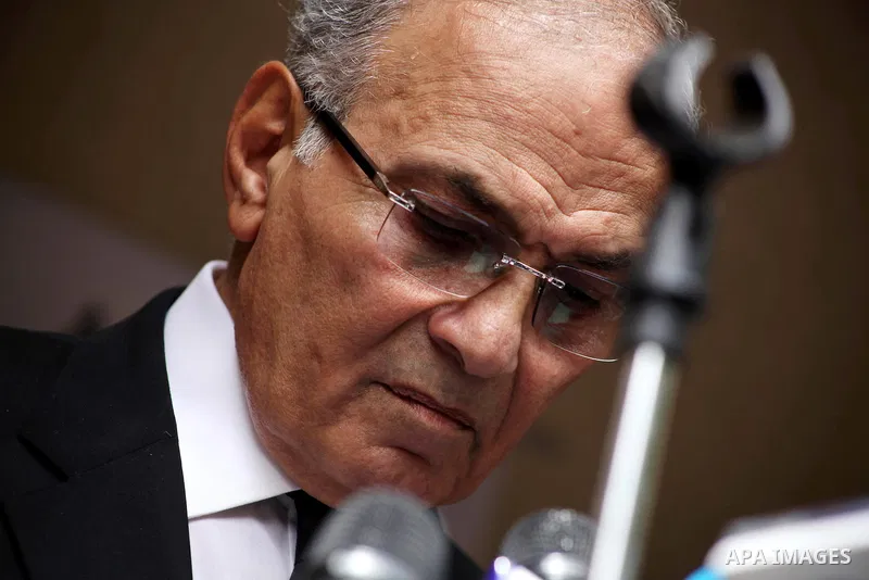 Egyptian presidential candidate Ahmed Shafiq speaks to the media during a press conference at his office in Cairo, Egypt, Saturday, May 26, 2012. Egyptian presidential candidate Ahmed Shafiq paid tribute Saturday to the...