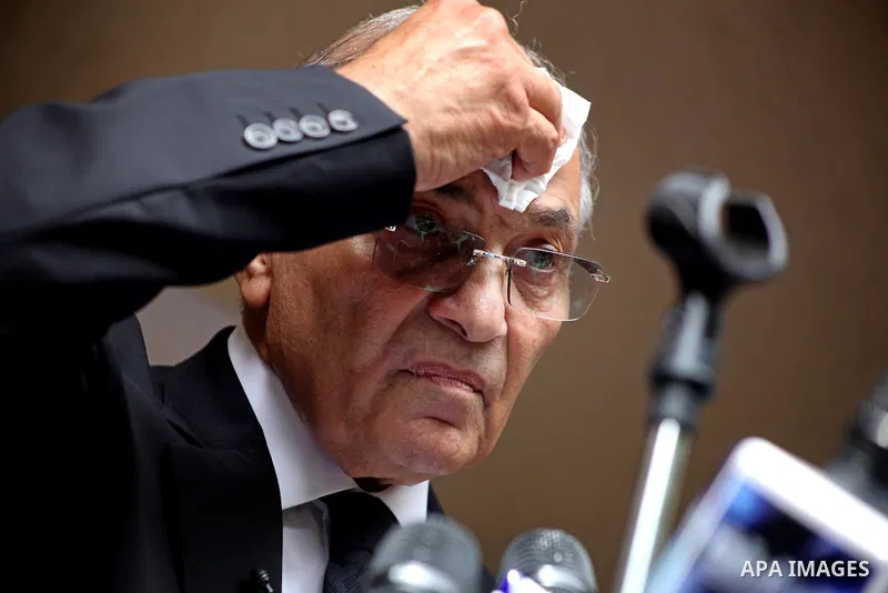 Egyptian presidential candidate Ahmed Shafiq speaks to the media during a press conference at his office in Cairo, Egypt, Saturday, May 26, 2012. Egyptian presidential candidate Ahmed Shafiq paid tribute Saturday to the...