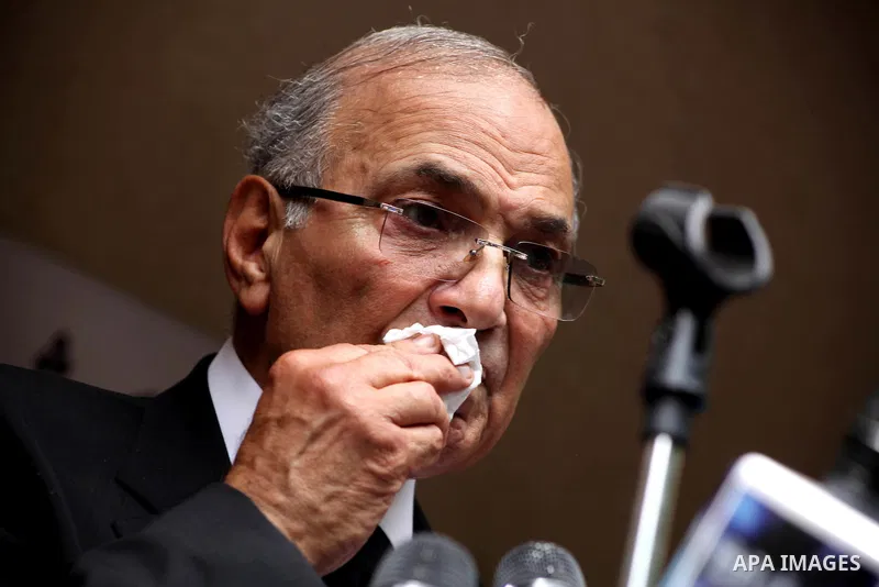 Egyptian presidential candidate Ahmed Shafiq speaks to the media during a press conference at his office in Cairo, Egypt, Saturday, May 26, 2012. Egyptian presidential candidate Ahmed Shafiq paid tribute Saturday to the...