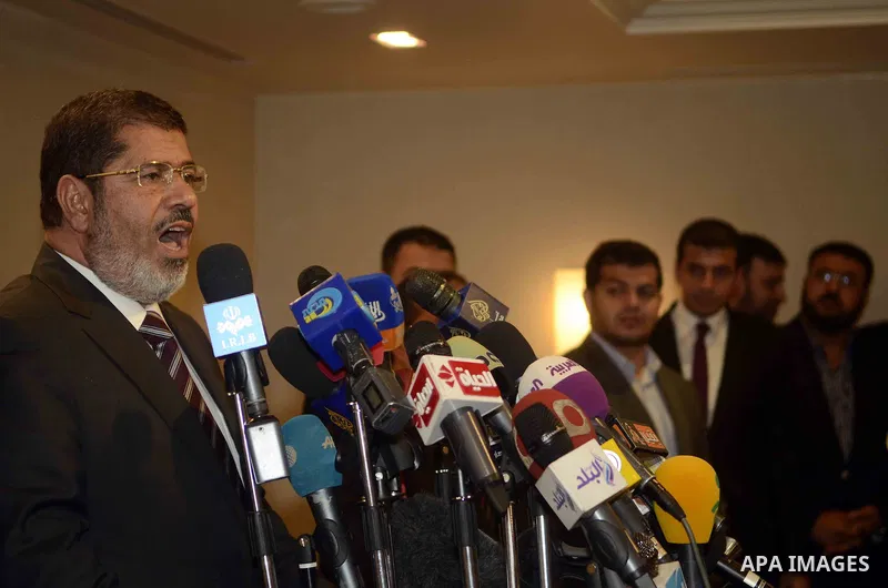 Muslim Brotherhood Egyptian presidential candidate Mohammed Mursi gives a press conference in Cairo on May 26, 2012. The Muslim Brotherhood today urged Egyptians to rally behind their presidential candidate in an almost...