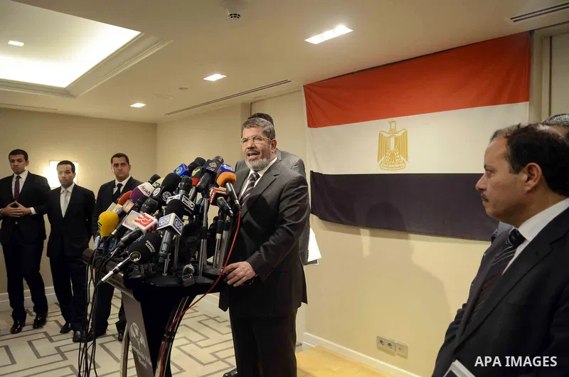 Muslim Brotherhood Egyptian presidential candidate Mohammed Mursi gives a press conference in Cairo on May 26, 2012. The Muslim Brotherhood today urged Egyptians to rally behind their presidential candidate in an almost...