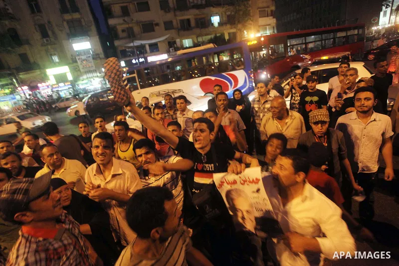 Egyptian protesters shout slogans during a protest against candidate Ahmed Shafiq and support candidate Hamdeen Sabahi, at Tahrir Square in Cairo May 27, 2012. The prospect of Shafiq succeeding Hosni Mubarak as president...