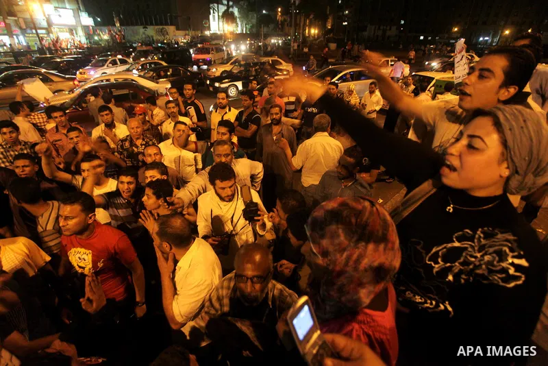 Egyptian protesters shout slogans during a protest against candidate Ahmed Shafiq and support candidate Hamdeen Sabahi, at Tahrir Square in Cairo May 27, 2012. The prospect of Shafiq succeeding Hosni Mubarak as president...