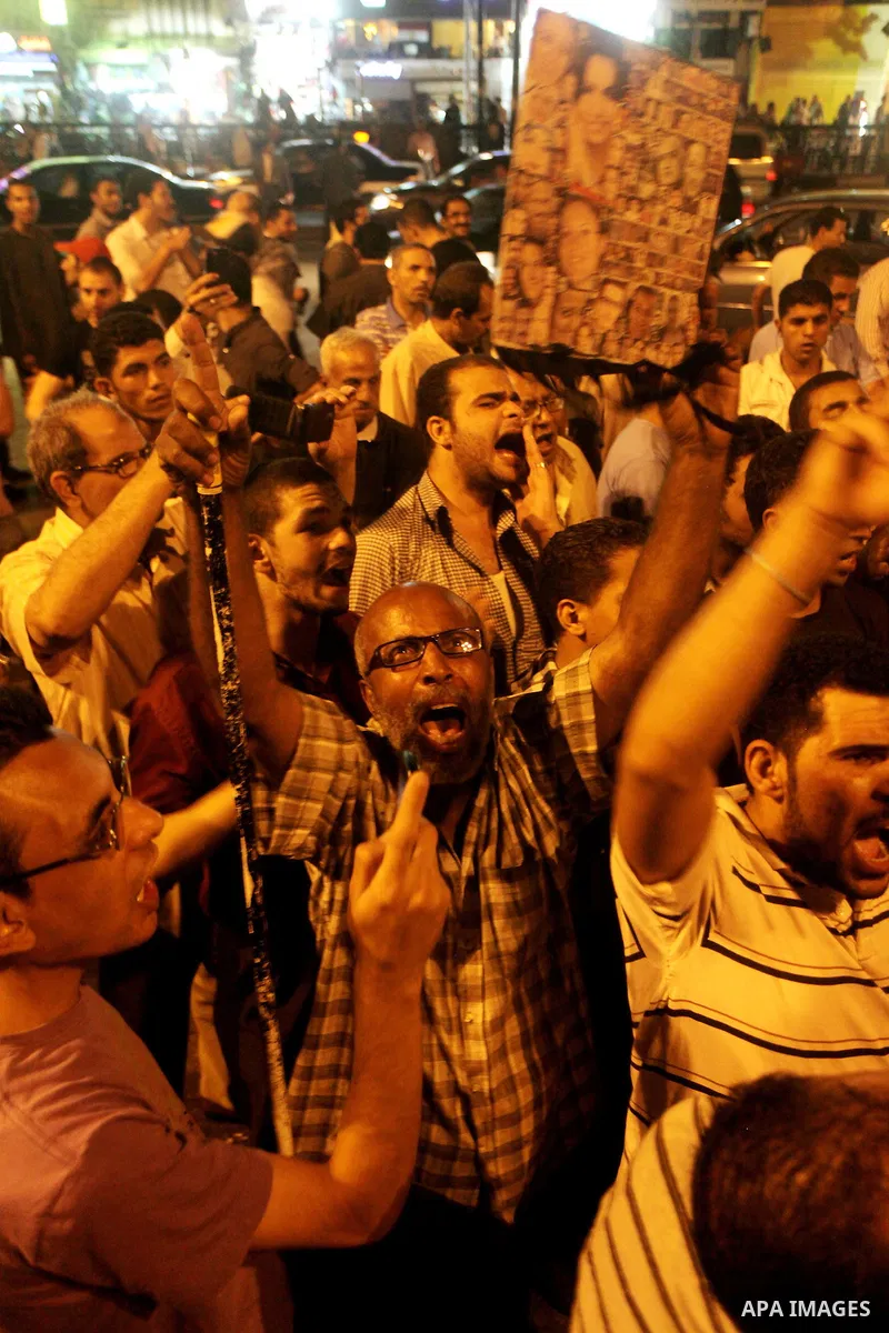 Egyptian protesters shout slogans during a protest against candidate Ahmed Shafiq and support candidate Hamdeen Sabahi, at Tahrir Square in Cairo May 27, 2012. The prospect of Shafiq succeeding Hosni Mubarak as president...