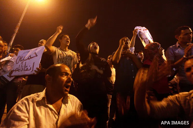 Egyptian protesters shout slogans during a protest against candidate Ahmed Shafiq and support candidate Hamdeen Sabahi, at Tahrir Square in Cairo May 27, 2012. The prospect of Shafiq succeeding Hosni Mubarak as president...