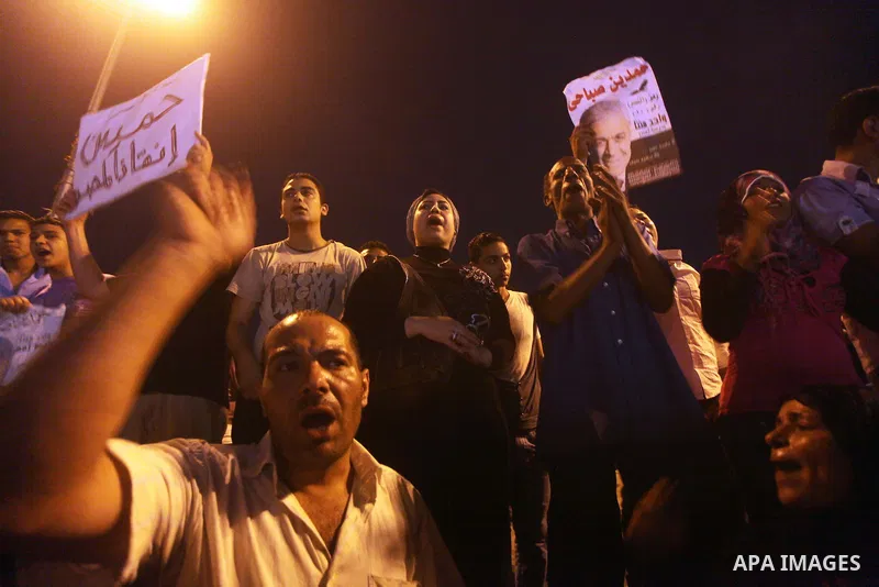 Egyptian protesters shout slogans during a protest against candidate Ahmed Shafiq and support candidate Hamdeen Sabahi, at Tahrir Square in Cairo May 27, 2012. The prospect of Shafiq succeeding Hosni Mubarak as president...
