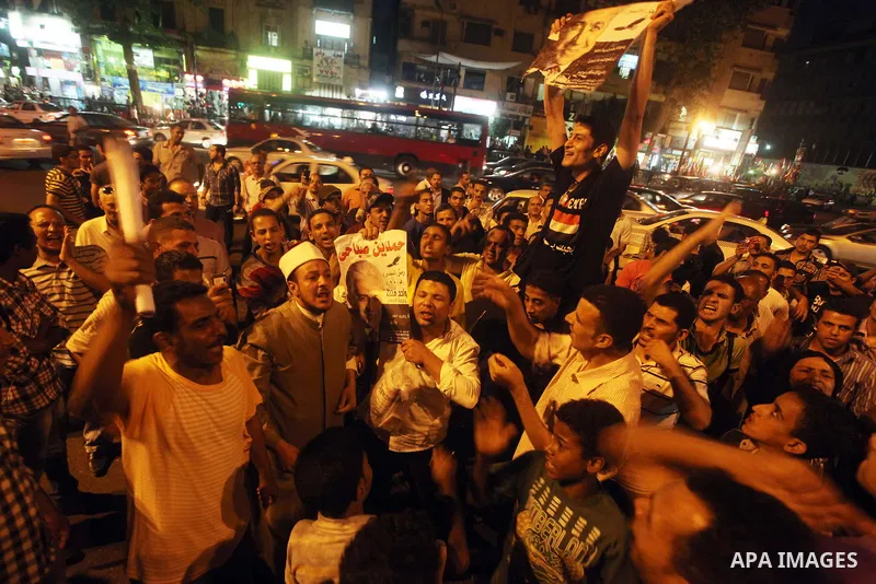 Egyptian protesters shout slogans during a protest against candidate Ahmed Shafiq and support candidate Hamdeen Sabahi, at Tahrir Square in Cairo May 27, 2012. The prospect of Shafiq succeeding Hosni Mubarak as president...