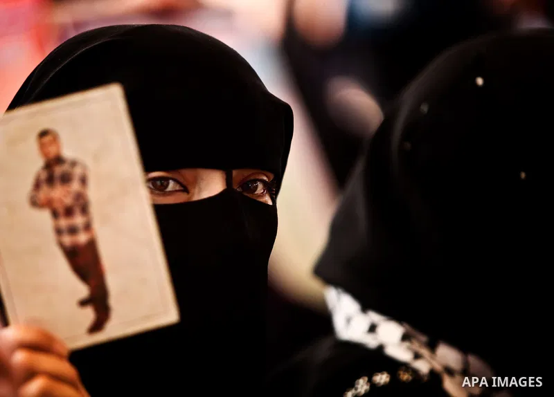 Relatives of Palestinian prisoners participate a protest at the Red Cross' offices in Gaza City to call for the release of Palestinian prisoners held in Israeli jails, on May. 28, 2012. Photo by Ali Jadallah