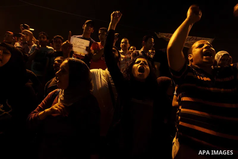 A youth takes part in a demonstration in Tahrir Square to protest the outcome of the Egyptian presidential election, Cairo, Egypt, Monday May 28, 2012. The runoff vote for Egypt's next president will pit the Muslim Broth...