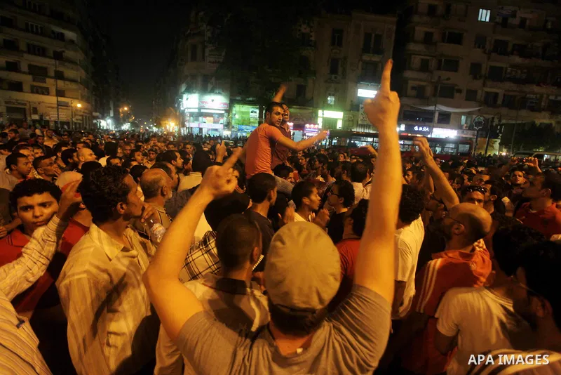 A youth takes part in a demonstration in Tahrir Square to protest the outcome of the Egyptian presidential election, Cairo, Egypt, Monday May 28, 2012. The runoff vote for Egypt's next president will pit the Muslim Broth...