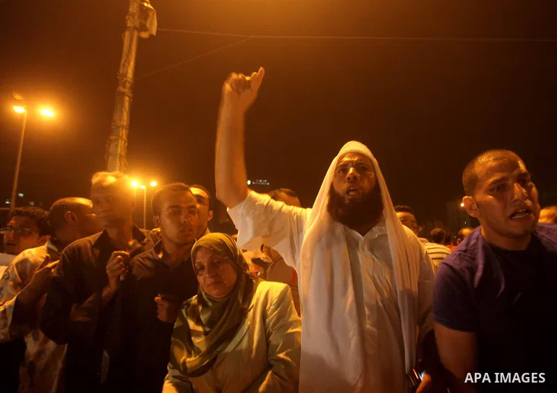 A youth takes part in a demonstration in Tahrir Square to protest the outcome of the Egyptian presidential election, Cairo, Egypt, Monday May 28, 2012. The runoff vote for Egypt's next president will pit the Muslim Broth...
