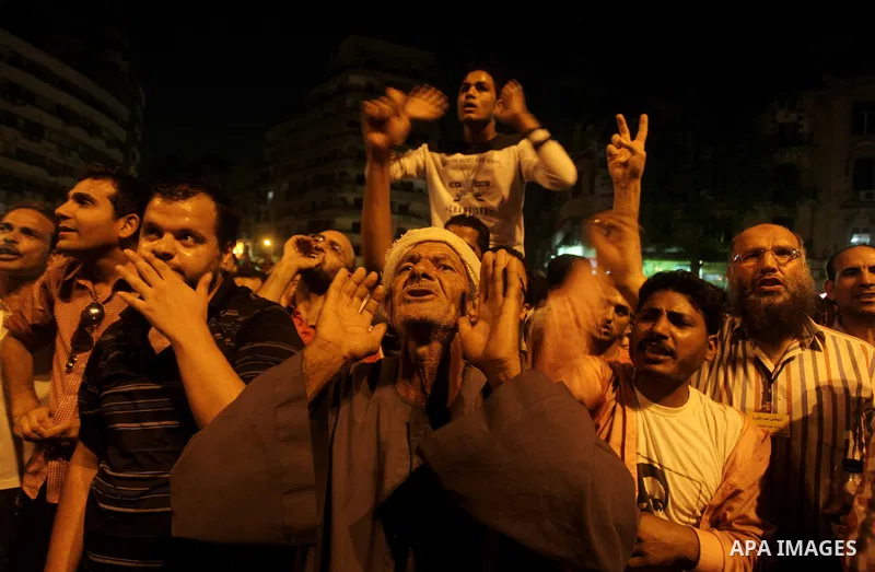 A youth takes part in a demonstration in Tahrir Square to protest the outcome of the Egyptian presidential election, Cairo, Egypt, Monday May 28, 2012. The runoff vote for Egypt's next president will pit the Muslim Broth...