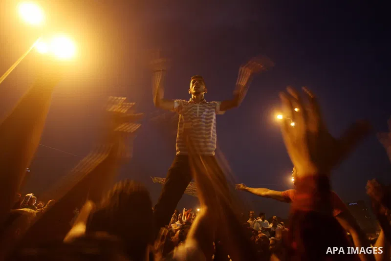 A youth takes part in a demonstration in Tahrir Square to protest the outcome of the Egyptian presidential election, Cairo, Egypt, Monday May 28, 2012. The runoff vote for Egypt's next president will pit the Muslim Broth...