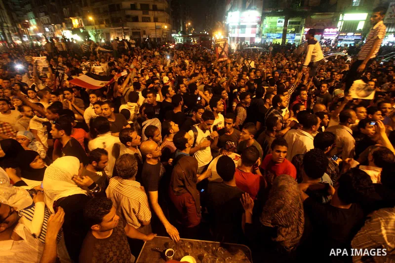A youth takes part in a demonstration in Tahrir Square to protest the outcome of the Egyptian presidential election, Cairo, Egypt, Monday May 28, 2012. The runoff vote for Egypt's next president will pit the Muslim Broth...