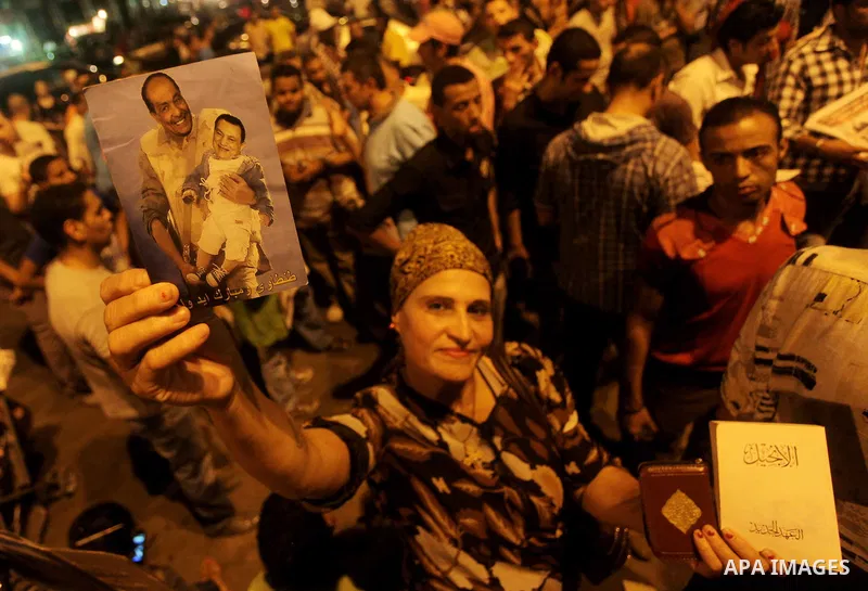 A youth takes part in a demonstration in Tahrir Square to protest the outcome of the Egyptian presidential election, Cairo, Egypt, Monday May 28, 2012. The runoff vote for Egypt's next president will pit the Muslim Broth...