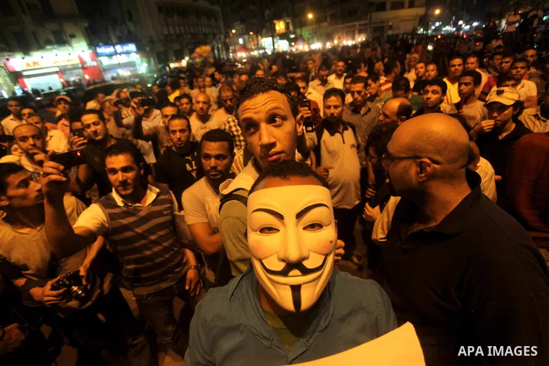 A youth takes part in a demonstration in Tahrir Square to protest the outcome of the Egyptian presidential election, Cairo, Egypt, Monday May 28, 2012. The runoff vote for Egypt's next president will pit the Muslim Broth...