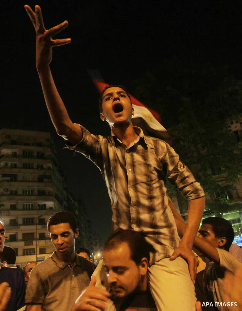 A youth takes part in a demonstration in Tahrir Square to protest the outcome of the Egyptian presidential election, Cairo, Egypt, Monday May 28, 2012. The runoff vote for Egypt's next president will pit the Muslim Broth...