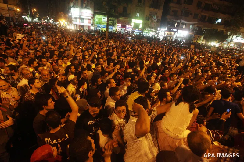 A youth takes part in a demonstration in Tahrir Square to protest the outcome of the Egyptian presidential election, Cairo, Egypt, Monday May 28, 2012. The runoff vote for Egypt's next president will pit the Muslim Broth...