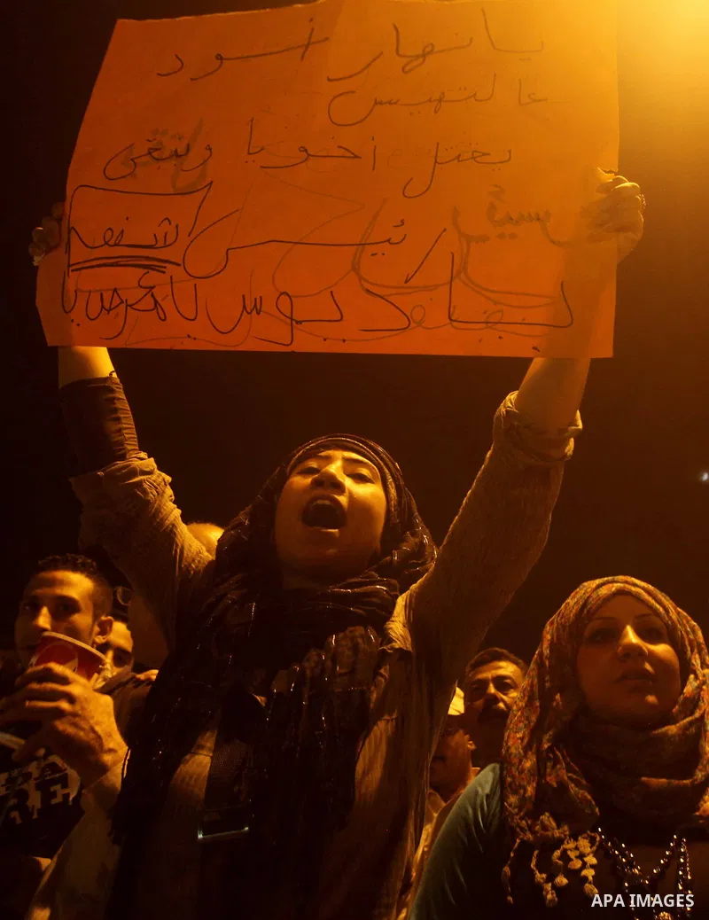 A youth takes part in a demonstration in Tahrir Square to protest the outcome of the Egyptian presidential election, Cairo, Egypt, Monday May 28, 2012. The runoff vote for Egypt's next president will pit the Muslim Broth...