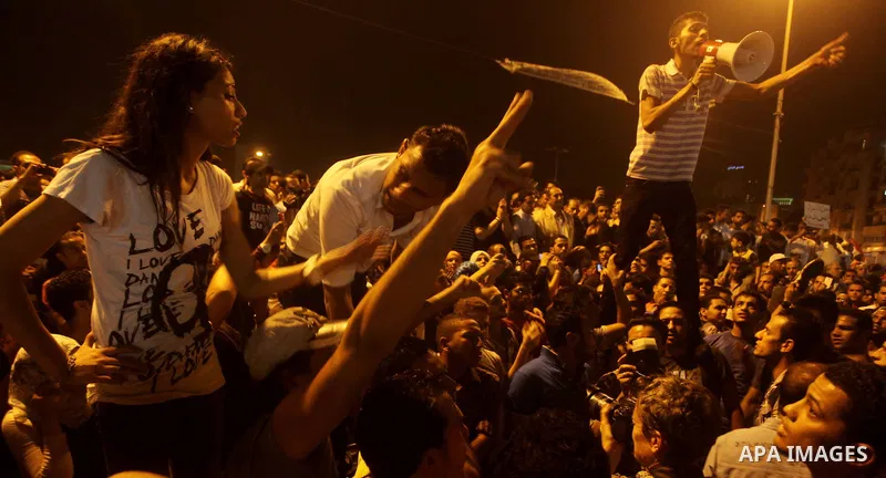 A youth takes part in a demonstration in Tahrir Square to protest the outcome of the Egyptian presidential election, Cairo, Egypt, Monday May 28, 2012. The runoff vote for Egypt's next president will pit the Muslim Broth...