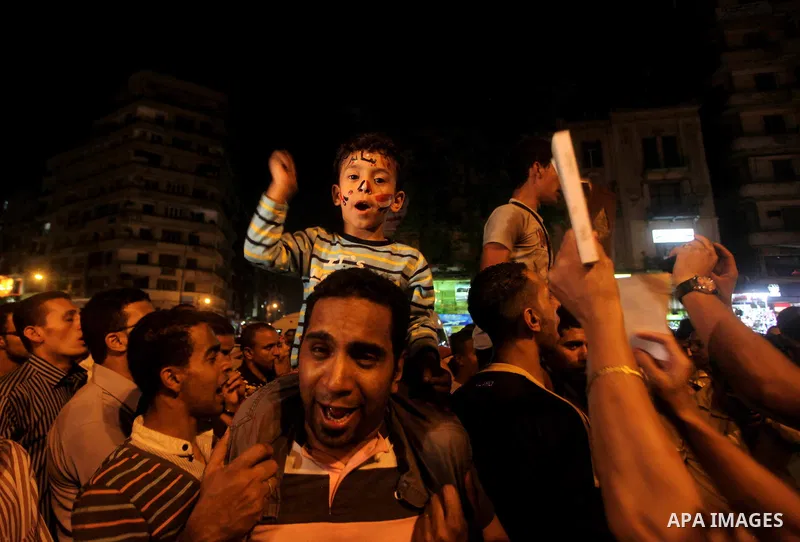 A youth takes part in a demonstration in Tahrir Square to protest the outcome of the Egyptian presidential election, Cairo, Egypt, Monday May 28, 2012. The runoff vote for Egypt's next president will pit the Muslim Broth...