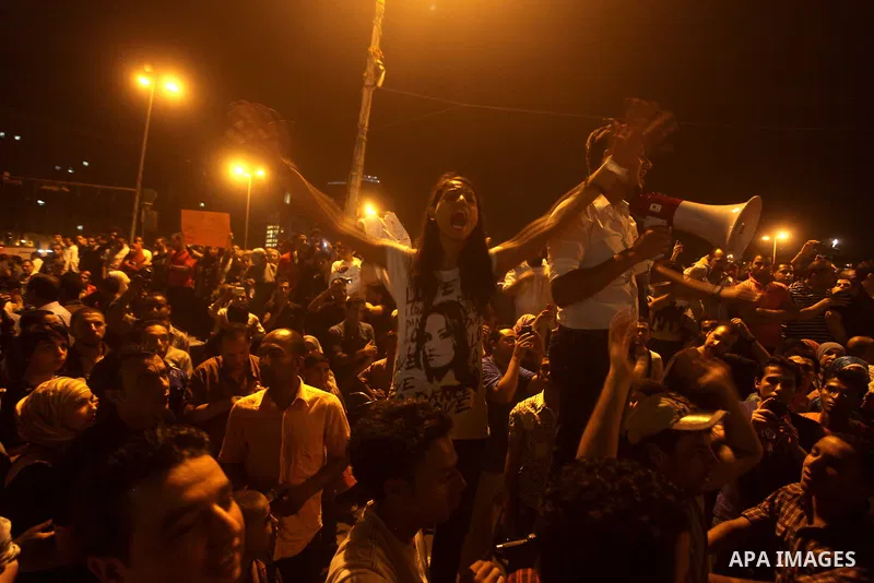 A youth takes part in a demonstration in Tahrir Square to protest the outcome of the Egyptian presidential election, Cairo, Egypt, Monday May 28, 2012. The runoff vote for Egypt's next president will pit the Muslim Broth...