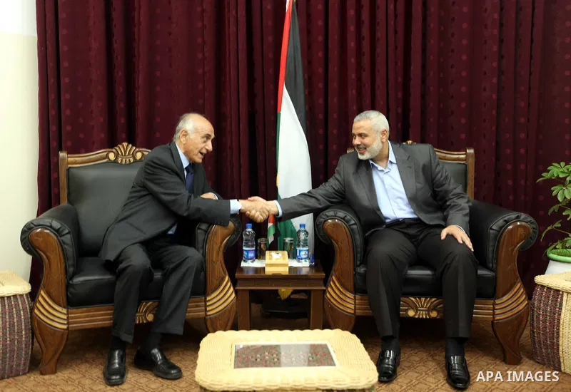 Palestinian prime minister in Gaza Strip, Ismail Haniyeh meets with Munib All-Masri in Gaza City May 29, 2012. Palestinian President Mahmoud Abbas's Fatah faction and Palestinian Islamist group Hamas began talks to form...