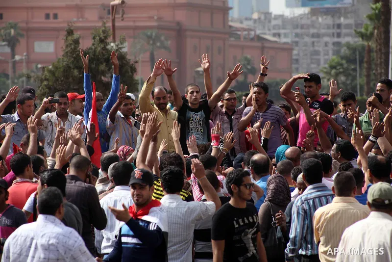 Egyptian protesters attend a demonstration, against presidential candidate Ahmed Shafiq at Tahrir Square in Cairo May 29, 2012. According to full official results released Monday by the election commission. Commission ch...