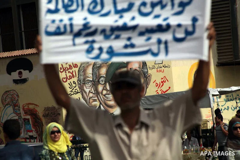 Egyptian protesters attend a demonstration, against presidential candidate Ahmed Shafiq at Tahrir Square in Cairo May 29, 2012. According to full official results released Monday by the election commission. Commission ch...