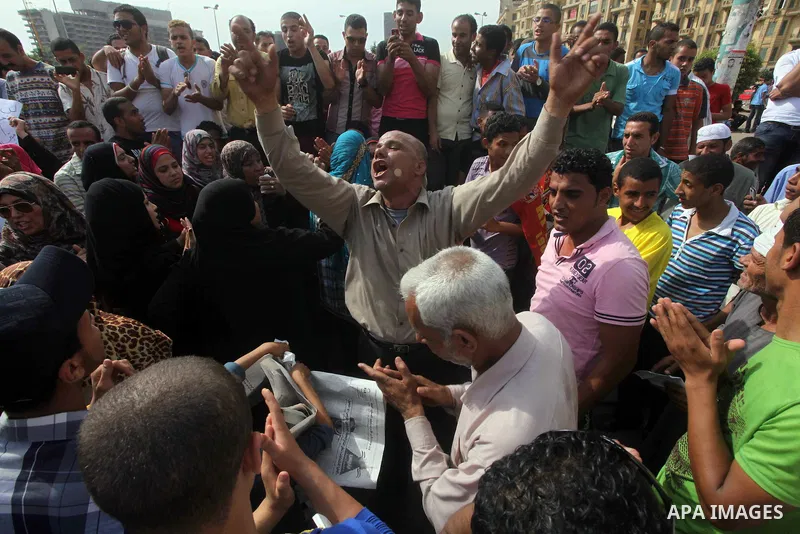 Egyptian protesters attend a demonstration, against presidential candidate Ahmed Shafiq at Tahrir Square in Cairo May 29, 2012. According to full official results released Monday by the election commission. Commission ch...