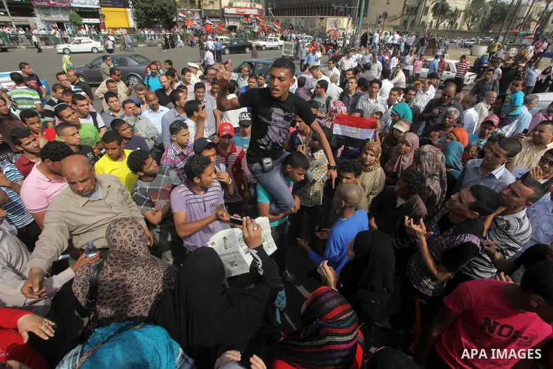 Egyptian protesters attend a demonstration, against presidential candidate Ahmed Shafiq at Tahrir Square in Cairo May 29, 2012. According to full official results released Monday by the election commission. Commission ch...