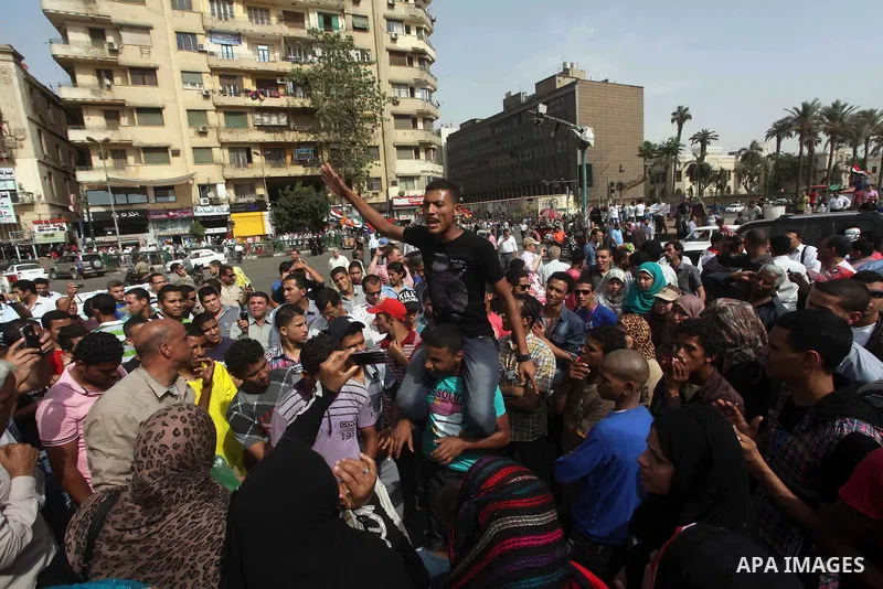 Egyptian protesters attend a demonstration, against presidential candidate Ahmed Shafiq at Tahrir Square in Cairo May 29, 2012. According to full official results released Monday by the election commission. Commission ch...