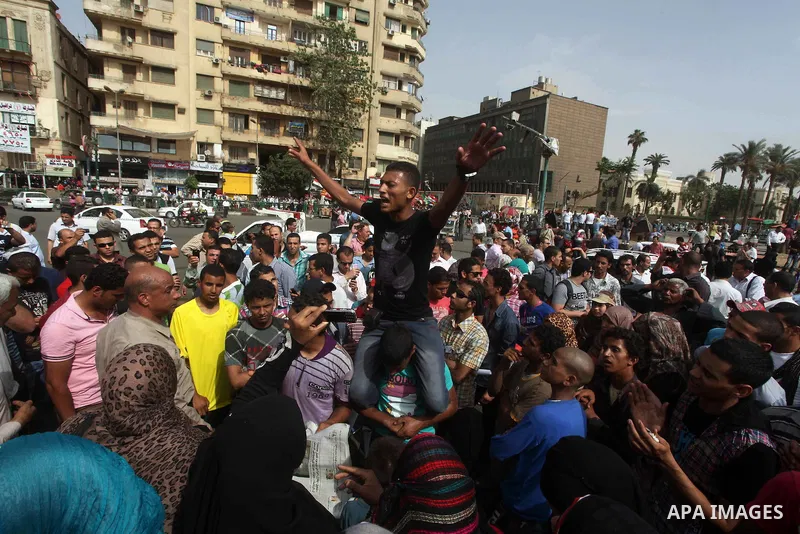 Egyptian protesters attend a demonstration, against presidential candidate Ahmed Shafiq at Tahrir Square in Cairo May 29, 2012. According to full official results released Monday by the election commission. Commission ch...