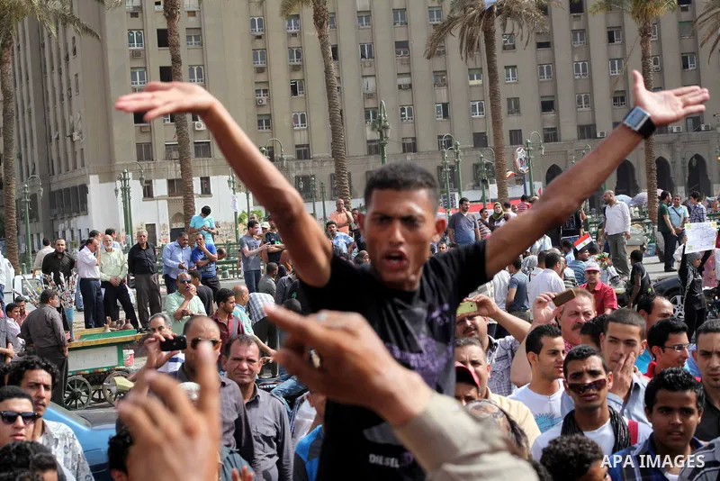 Egyptian protesters attend a demonstration, against presidential candidate Ahmed Shafiq at Tahrir Square in Cairo May 29, 2012. According to full official results released Monday by the election commission. Commission ch...