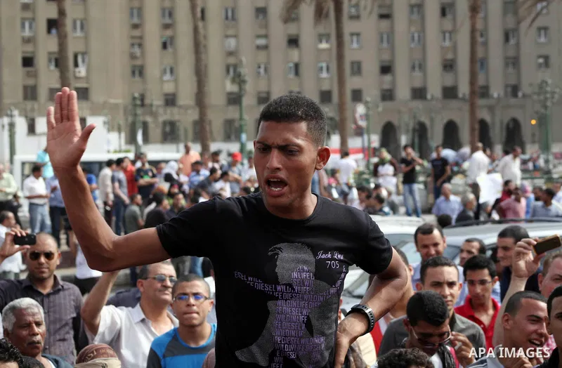 Egyptian protesters attend a demonstration, against presidential candidate Ahmed Shafiq at Tahrir Square in Cairo May 29, 2012. According to full official results released Monday by the election commission. Commission ch...