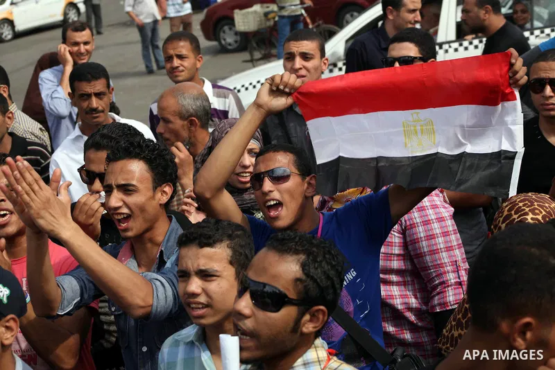 Egyptian protesters attend a demonstration, against presidential candidate Ahmed Shafiq at Tahrir Square in Cairo May 29, 2012. According to full official results released Monday by the election commission. Commission ch...