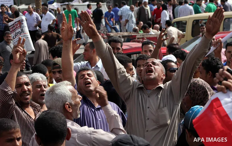 Egyptian protesters attend a demonstration, against presidential candidate Ahmed Shafiq at Tahrir Square in Cairo May 29, 2012. According to full official results released Monday by the election commission. Commission ch...
