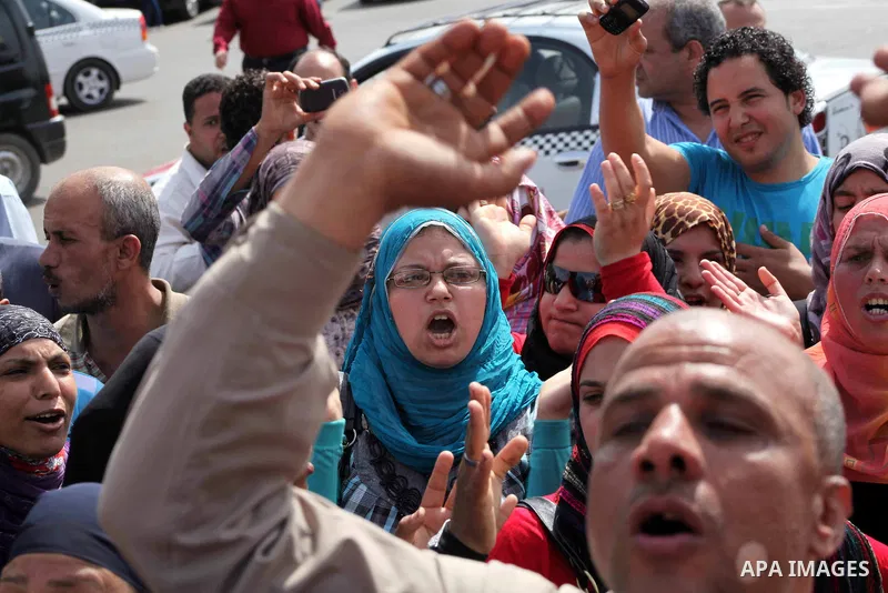 Egyptian protesters attend a demonstration, against presidential candidate Ahmed Shafiq at Tahrir Square in Cairo May 29, 2012. According to full official results released Monday by the election commission. Commission ch...