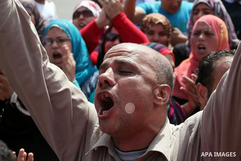 Egyptian protesters attend a demonstration, against presidential candidate Ahmed Shafiq at Tahrir Square in Cairo May 29, 2012. According to full official results released Monday by the election commission. Commission ch...