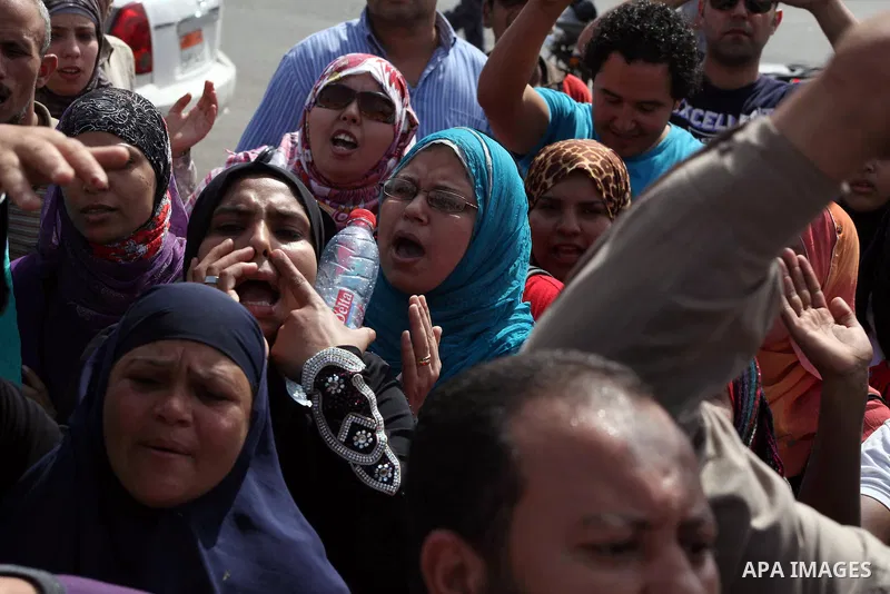 Egyptian protesters attend a demonstration, against presidential candidate Ahmed Shafiq at Tahrir Square in Cairo May 29, 2012. According to full official results released Monday by the election commission. Commission ch...
