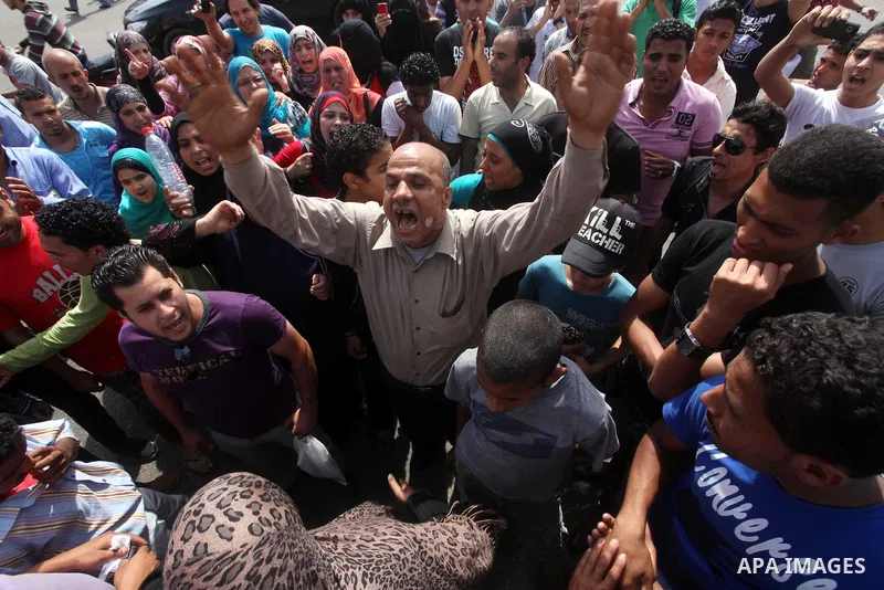 Egyptian protesters attend a demonstration, against presidential candidate Ahmed Shafiq at Tahrir Square in Cairo May 29, 2012. According to full official results released Monday by the election commission. Commission ch...