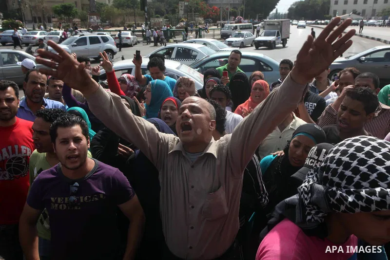 Egyptian protesters attend a demonstration, against presidential candidate Ahmed Shafiq at Tahrir Square in Cairo May 29, 2012. According to full official results released Monday by the election commission. Commission ch...