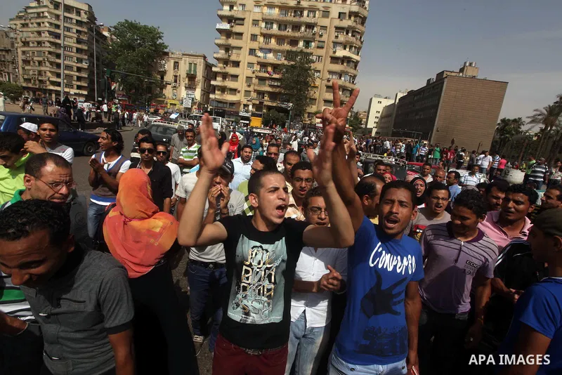 Egyptian protesters attend a demonstration, against presidential candidate Ahmed Shafiq at Tahrir Square in Cairo May 29, 2012. According to full official results released Monday by the election commission. Commission ch...
