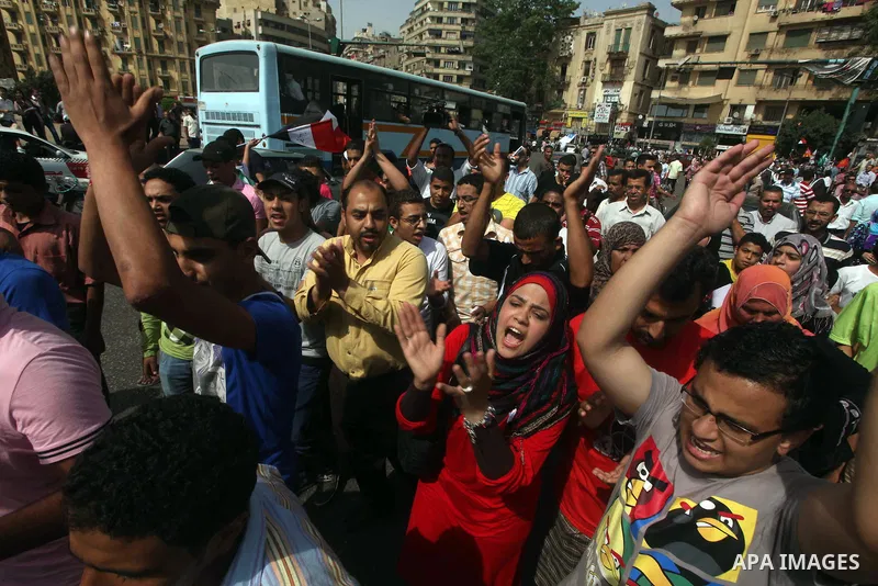 Egyptian protesters attend a demonstration, against presidential candidate Ahmed Shafiq at Tahrir Square in Cairo May 29, 2012. According to full official results released Monday by the election commission. Commission ch...