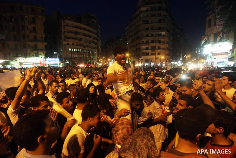 Egyptian protesters attend a demonstration, against presidential candidates Mohammed Morsi and Ahmed Shafiq at Tahrir Square in Cairo May 29, 2012. According to full official results released Monday by the election commi...