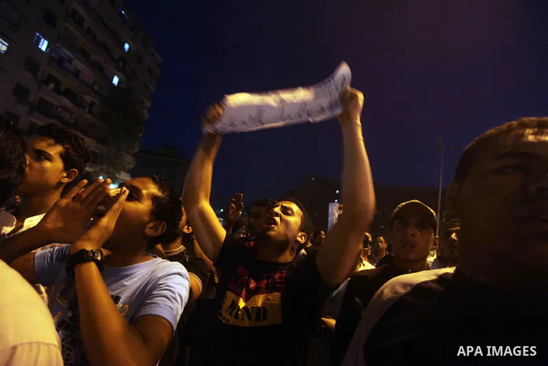 Egyptian protesters attend a demonstration, against presidential candidates Mohammed Morsi and Ahmed Shafiq at Tahrir Square in Cairo May 29, 2012. According to full official results released Monday by the election commi...