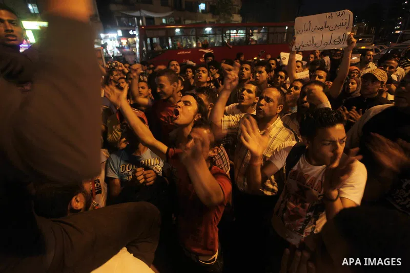 Egyptian protesters attend a demonstration, against presidential candidates Mohammed Morsi and Ahmed Shafiq at Tahrir Square in Cairo May 29, 2012. According to full official results released Monday by the election commi...