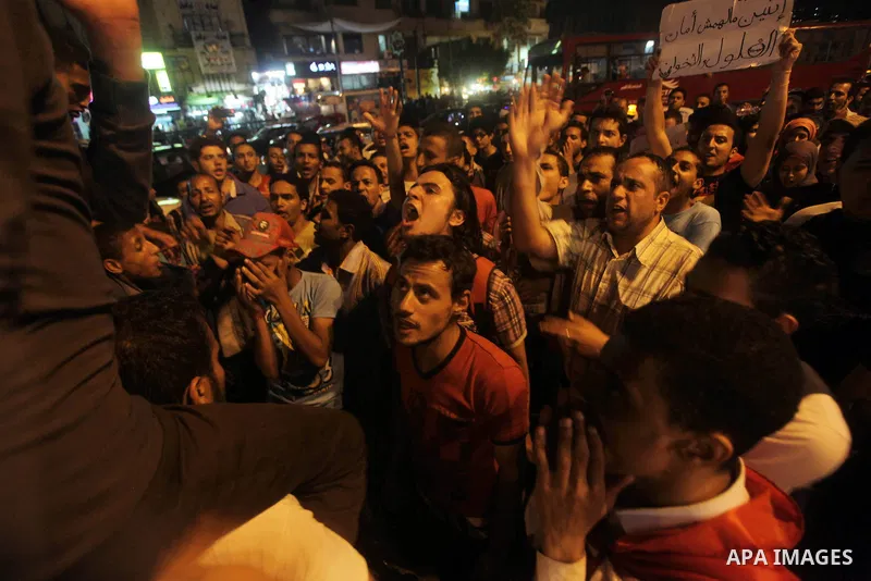 Egyptian protesters attend a demonstration, against presidential candidates Mohammed Morsi and Ahmed Shafiq at Tahrir Square in Cairo May 29, 2012. According to full official results released Monday by the election commi...