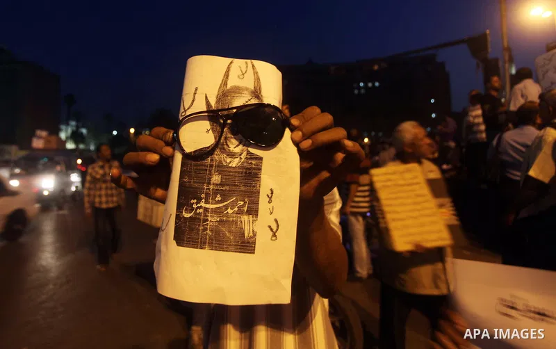 Egyptian protesters attend a demonstration, against presidential candidates Mohammed Morsi and Ahmed Shafiq at Tahrir Square in Cairo May 29, 2012. According to full official results released Monday by the election commi...