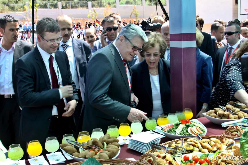 German Federal President Joachim Gauck, and his partner Daniela Schadt, take part during Opening Ceremony of Palestinian school in the Burin Village near the West Bank City of Nablus, 31 May 2012. The German head of stat...